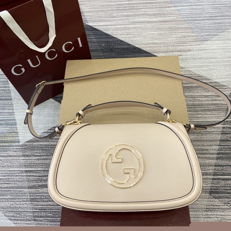 G*u*i top handle bags